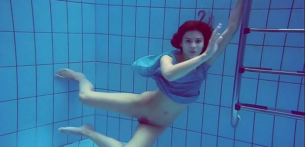  Sexy tight teen Marusia swims naked underwater